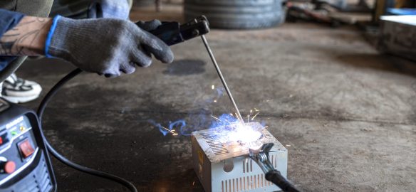 male-mechanic-working-his-workshop